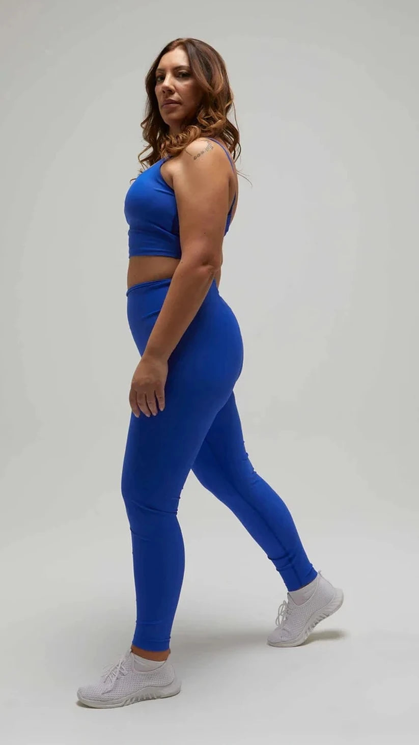 Completo sportivo blu elettrico Flexivel con leggings a vita alta e top, vista laterale