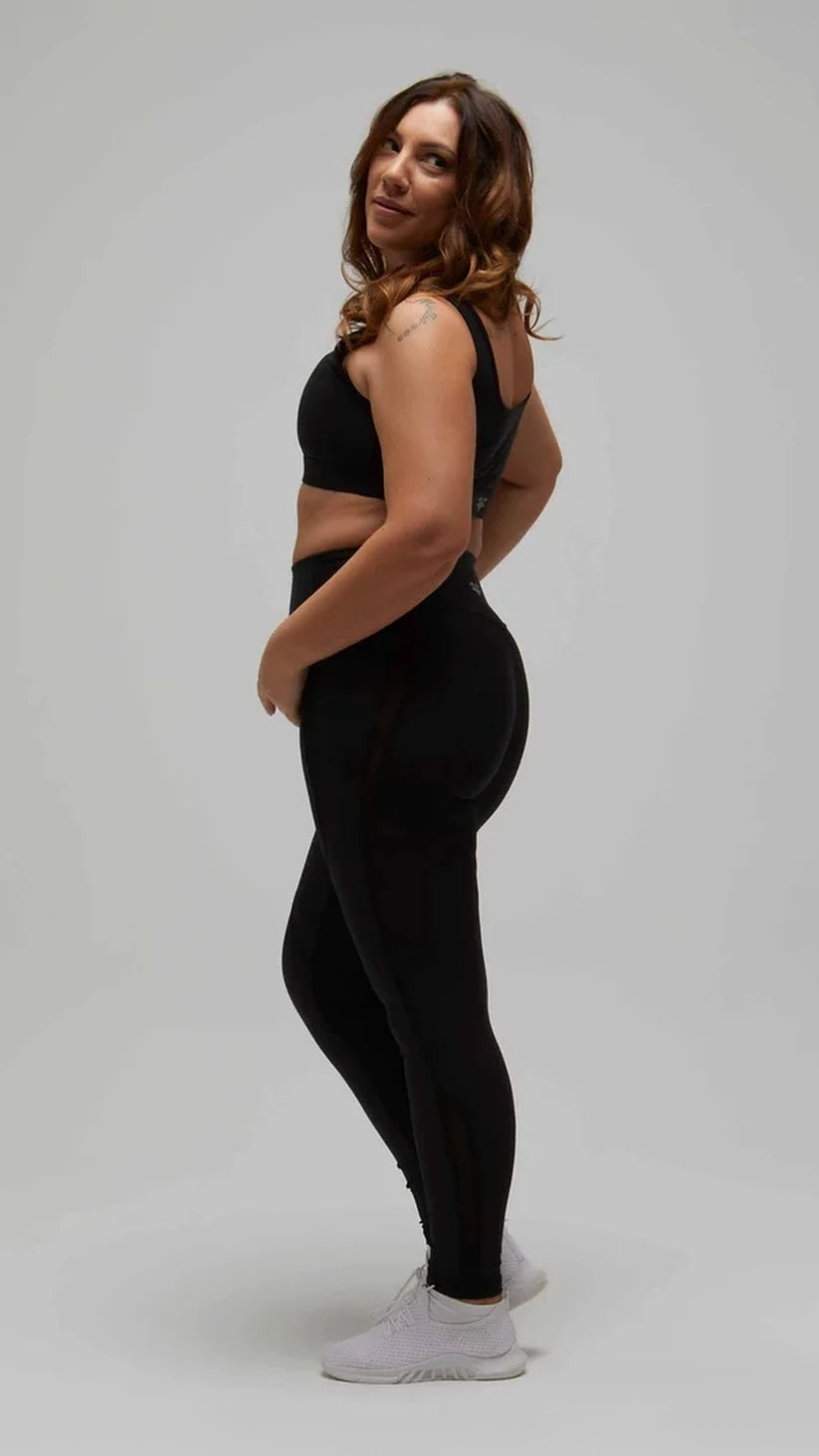 Leggings neri Flexivel effetto push-up con inserti in rete, vista laterale a figura intera